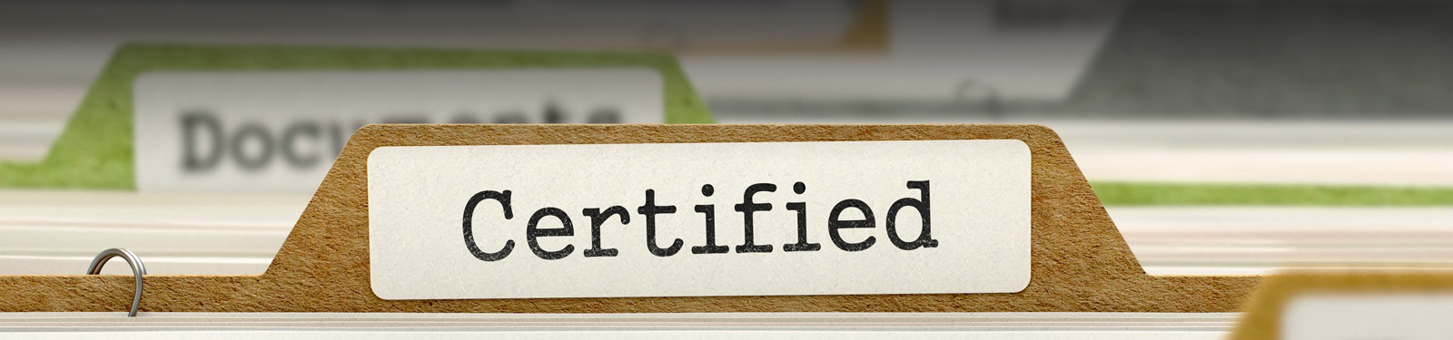 File folder with the word Certified on it's label.