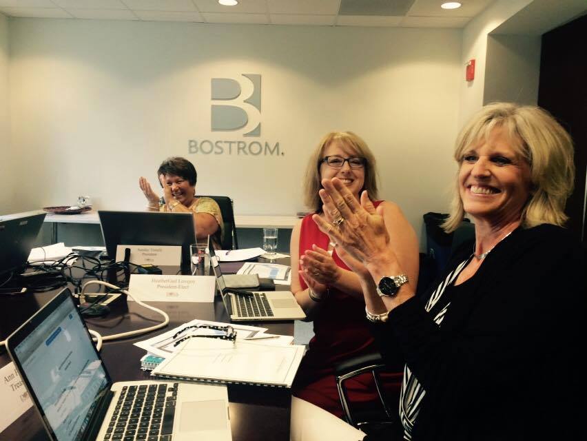 Board members celebrate a decision that will benefit our membership!